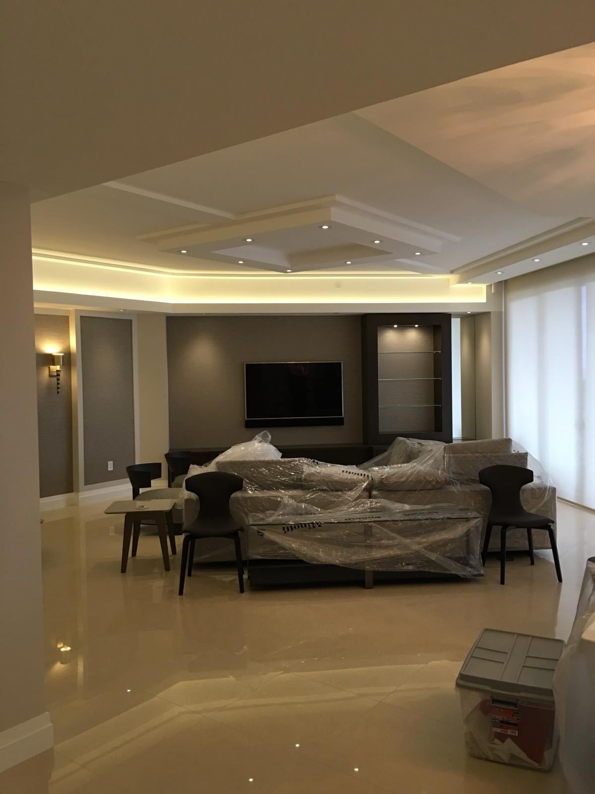 Modern condo living room with tray ceiling