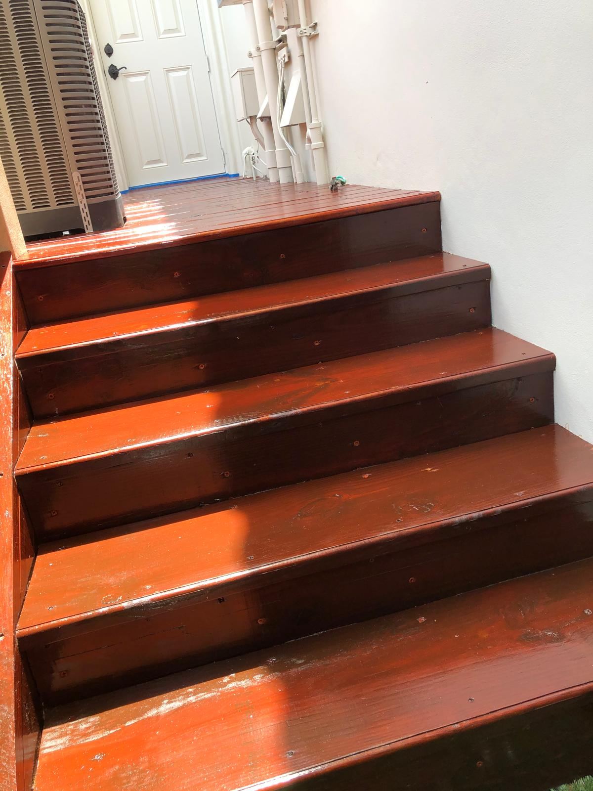 Wood deck stairs freshly stained