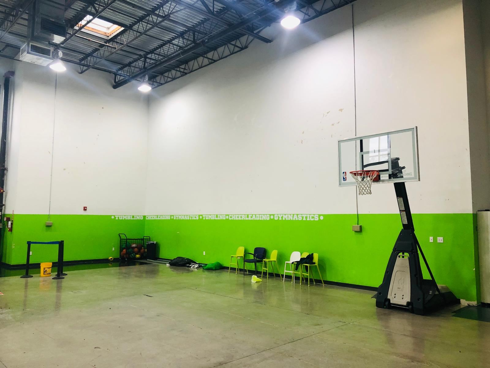Gym interior with green and white walls