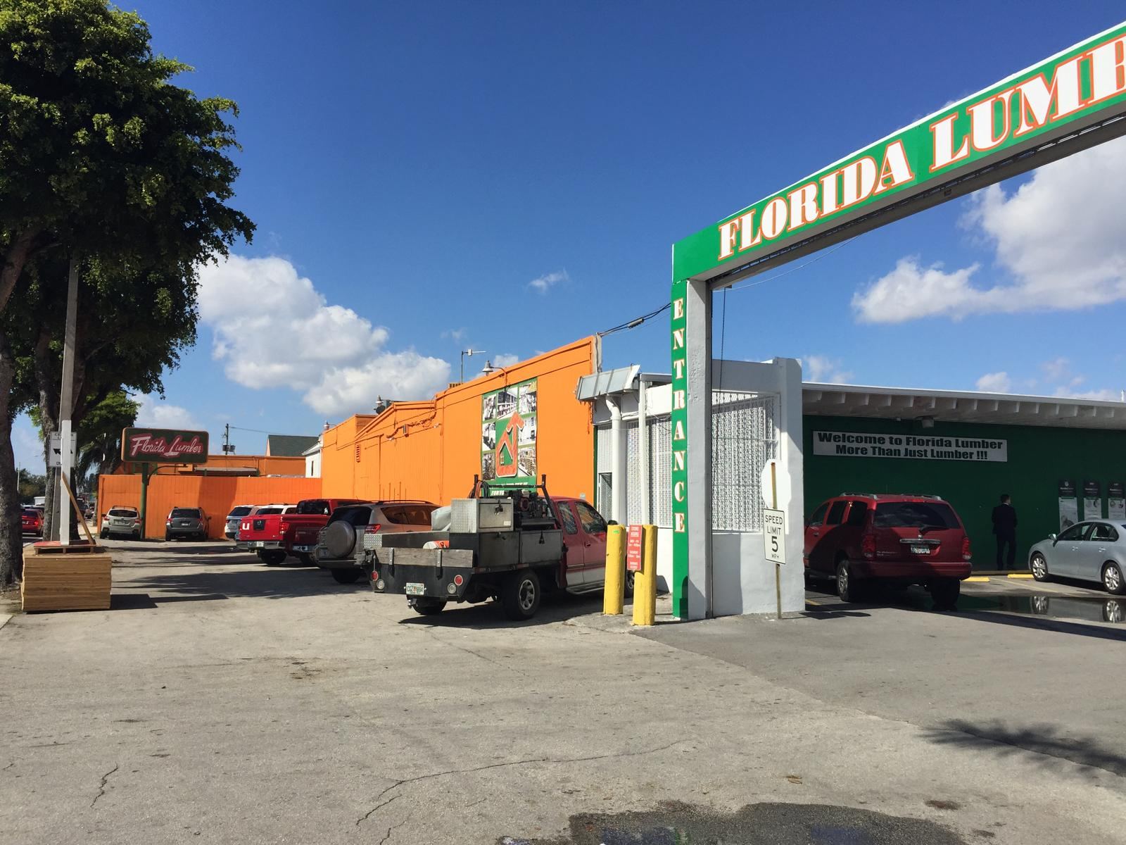 Retail building painted bright orange and green